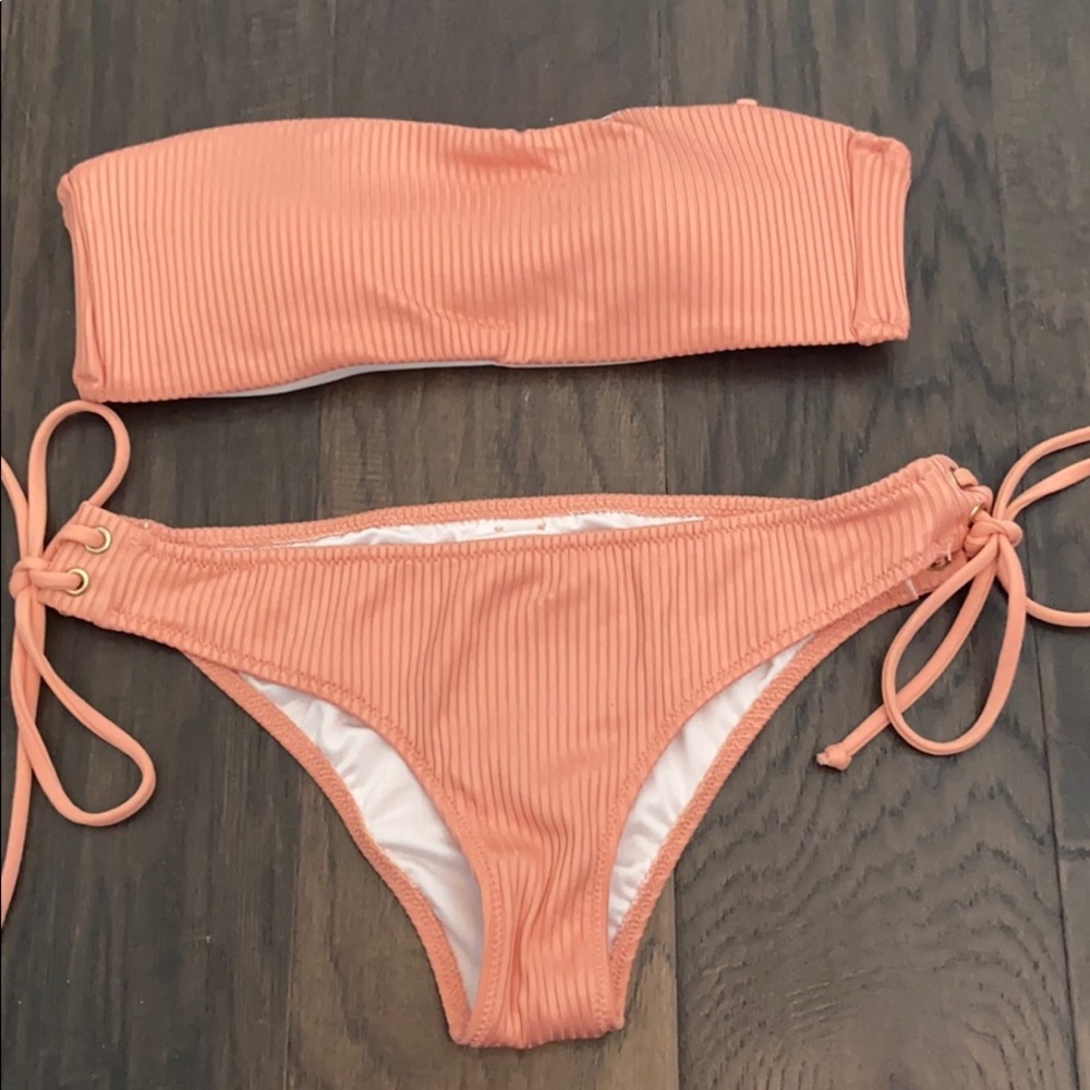 blush color bathing suit